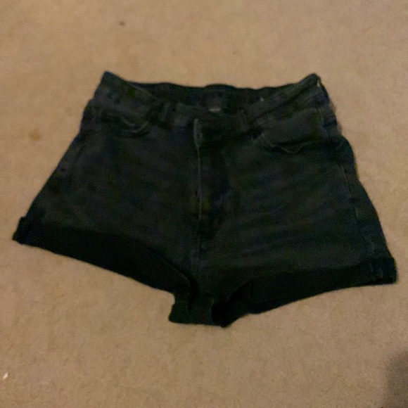 Black stretchy American Eagle jeans with a cross over waist - Picture 1 of 6